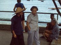 China 1988 older woman wearing traditional hat, Repulse Bay, Hong Kong