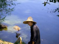 China 1988 farmer with his buffels