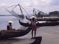 India 1987  chinese style fishermen on beach, Fort Cochin