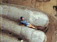 China 1988  Leshan, Sichuan, frank on toe of Buddha.