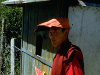 China 1988  Buddha and melon is all you need. Monnik op de hoogvlakte van Sichuan.