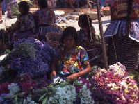 Central America 1998  flower salewoman in Chichicastenango, Guatemala